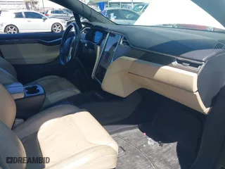 2016 Tesla Model X 70D with VIN 5YJXCBE2XGF013295, listed as a IAAI auction lot 41862736 with 96,190 mi miles. Bid and sale history available at carsss.com. Image 5.