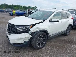 2018 Honda CR-V Touring with VIN 2HKRW2H91JH665241, listed as a IAAI auction lot 42638694 with 62,066 mi miles and . Bid and sale history available at DreamBid. Image 17.