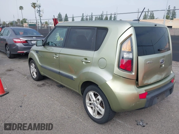 2011 Kia Soul + with VIN KNDJT2A2XB7205827, listed as a IAAI auction lot 41889620 with 158,965 mi miles. Bid and sale history available at carsss.com. Image 3.