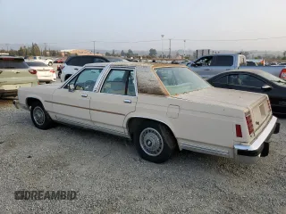 1986 Ford Crown Victoria z VIN 2FABP43F4GX118923, wystawiony jako Copart lot #76413794 z przebiegiem 74 097 mil mil oraz Tytuł czysty. Historia ofert i sprzedaży dostępna na DreamBid. Obrazek 2.