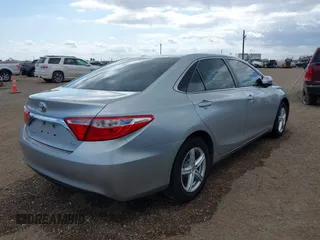 2015 Toyota Camry XLE with VIN 4T1BF1FK1FU475840, listed as a IAAI auction lot 41669607 with 104,881 mi miles. Bid and sale history available at carsss.com. Image 4.