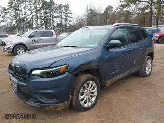 2020 Jeep Cherokee Latitude with VIN 1C4PJLCB3LD528042, listed as a IAAI auction lot 41301453 with 129,188 mi miles. Bid and sale history available at carsss.com. Image 2.