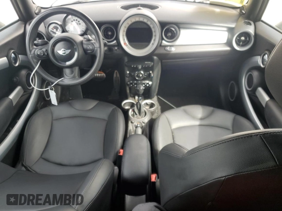 2014 MINI Convertible S with VIN WMWZP3C53ET707205, listed as a Copart auction lot 52179175 with 101,209 mi miles and Salvage Title. Bid and sale history available at DreamBid. Image 8.
