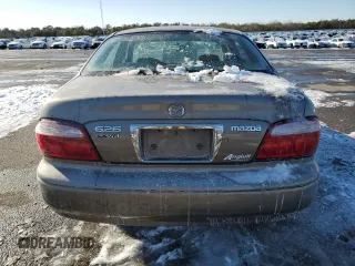 2001 Mazda 626 LX with VIN 1YVGF22D815242283, listed as a Copart auction lot 42141985 with 36,448 mi miles and Salvage Title. Bid and sale history available at carsss.com. Image 6.