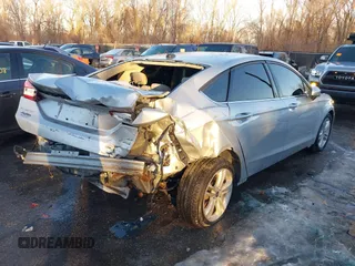 2018 Ford Fusion SE z VIN 3FA6P0LU4JR269064, wystawiony jako IAAI lot #41222967 z przebiegiem 115 077 mil mil oraz . Historia ofert i sprzedaży dostępna na DreamBid. Obrazek 4.