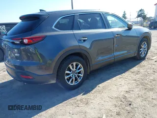 2016 Mazda CX-9 Sport with VIN JM3TCBBY8G0118088, listed as a IAAI auction lot 41710275 with 128,400 mi miles. Bid and sale history available at carsss.com. Image 4.