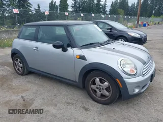2007 MINI Hardtop with VIN WMWMF33557TU61953, listed as a IAAI auction lot 42678840 with 139,665 mi miles and . Bid and sale history available at DreamBid. Image 1.