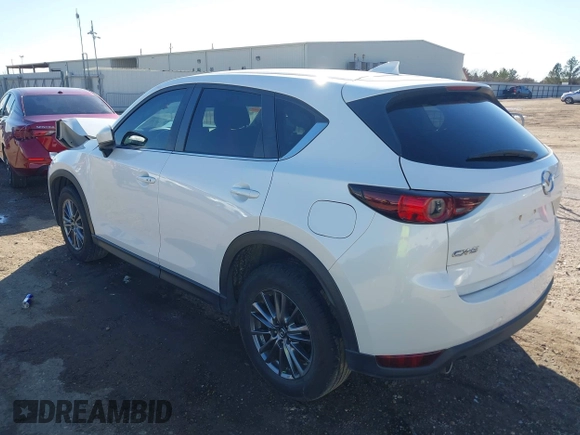 2019 Mazda CX-5 Touring with VIN JM3KFACM4K1668352, listed as a IAAI auction lot 41481291 with 65,901 mi miles and . Bid and sale history available at carsss.com. Image 3.