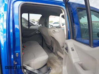 2014 Nissan Frontier SV with VIN 1N6AD0ER1EN765693, listed as a IAAI auction lot 41560914 with 165,572 mi miles and . Bid and sale history available at DreamBid. Image 8.