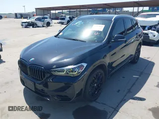 2021 BMW X1 sDrive28i with VIN WBXJG7C07M3M65841, listed as a IAAI auction lot 41877032 with 79,817 mi miles and . Bid and sale history available at DreamBid. Image 18.
