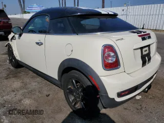 2013 MINI Coupe S z VIN WMWSX3C59DT466931, wystawiony jako Copart lot #75463804 z przebiegiem Nie podano mil oraz Szkody całkowita. Historia ofert i sprzedaży dostępna na DreamBid. Obrazek 2.