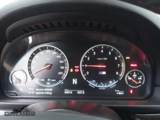 2013 BMW M5 with VIN WBSFV9C51DD095750, listed as a IAAI auction lot 40907304 with 93,014 mi miles. Bid and sale history available at carsss.com. Image 7.