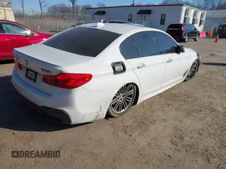 2018 BMW 5 Series M550i xDrive with VIN WBAJB9C53JB036097, listed as a IAAI auction lot 41743031 with 70,164 mi miles and . Bid and sale history available at carsss.com. Image 4.