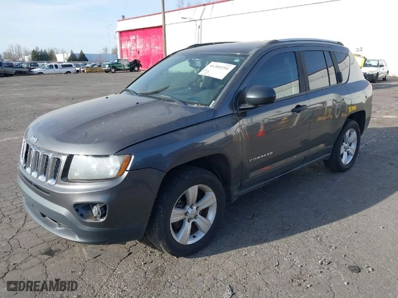 2014 Jeep Compass Sport with VIN 1C4NJCBB5ED730151, listed as a IAAI auction lot 41389291 with 176,659 mi miles. Bid and sale history available at carsss.com. Image 2.