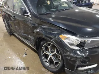 2018 BMW X1 xDrive28i with VIN WBXHT3C30J5K29383, listed as a IAAI auction lot 41503314 with 107,678 mi miles. Bid and sale history available at carsss.com. Image 6.