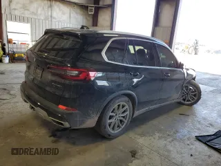 2021 BMW X5 xDrive40i with VIN 5UXCR6C01M9F08658, listed as a Copart auction lot 49910884 with 0 mi miles and Salvage Title. Bid and sale history available at carsss.com. Image 3.