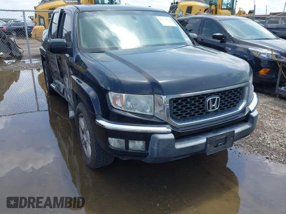 2011 Honda Ridgeline RTL with VIN 5FPYK1F54BB011472, listed as a IAAI auction lot 42112512 with 194,974 mi miles and . Bid and sale history available at DreamBid. Image 1.