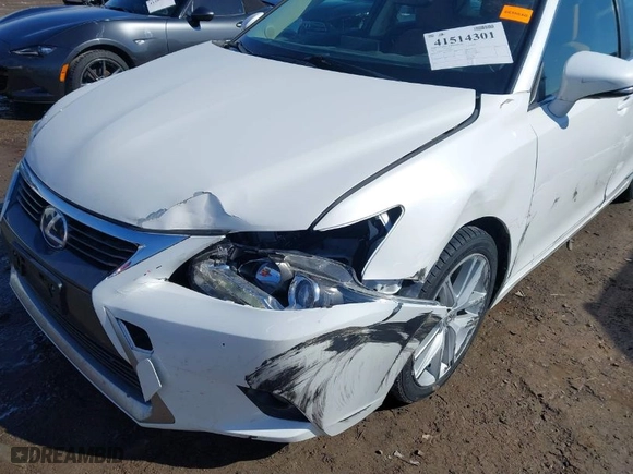 2014 Lexus CT 200h Hybrid with VIN JTHKD5BHXE2195743, listed as a IAAI auction lot 41514301 with 136,631 mi miles. Bid and sale history available at carsss.com. Image 6.