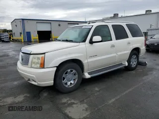 2003 Cadillac Escalade z VIN 1GYEC63T93R208877, wystawiony jako Copart lot #83894424 z przebiegiem 160 530 mil mil oraz Szkoda całkowita • Salvage title. Historia ofert i sprzedaży dostępna na DreamBid. Obrazek 1.