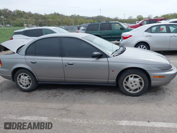 1997 Saturn SL with VIN 1G8ZK527XVZ257477, listed as a IAAI auction lot 42029648 with 114,371 mi miles and . Bid and sale history available at DreamBid. Image 13.