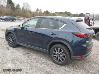2017 Mazda CX-5 Grand Touring with VIN JM3KFBDL9H0180038, listed as a IAAI auction lot 41394047 with 111,581 mi miles. Bid and sale history available at carsss.com. Image 3.