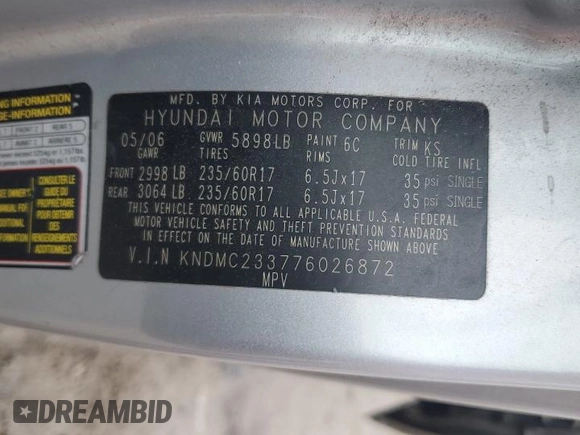 2007 Hyundai Entourage GLS z VIN KNDMC233776026872, wystawiony jako Copart lot #50650865 z przebiegiem 235 202 mil mil oraz Szkoda całkowita • Salvage title. Historia ofert i sprzedaży dostępna na DreamBid. Obrazek 13.