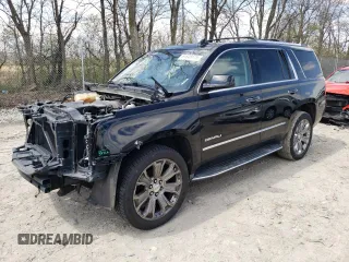 2015 GMC Yukon Denali with VIN 1GKS2CKJXFR702247, listed as a Copart auction lot 51648175 with 151,936 mi miles and Salvage Title. Bid and sale history available at carsss.com. Image 1.
