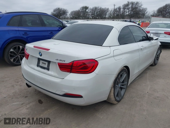 2018 BMW 4 Series 430i with VIN WBA4Z1C59JEC59501, listed as a IAAI auction lot 41588339 with 76,151 mi miles and . Bid and sale history available at carsss.com. Image 4.