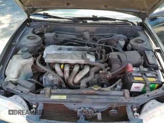 1999 Toyota Corolla VE with VIN 1NXBR12E7XZ240321, listed as a Copart auction lot 64259115 with 144,145 mi miles and Salvage title. Bid and sale history available at DreamBid. Image 11.