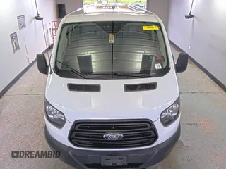 2019 Ford Transit with VIN 1FTYE1YM0KKB31938, listed as a IAAI auction lot 42667322 with 196,239 mi miles and . Bid and sale history available at DreamBid. Image 24.