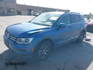 2018 Volkswagen Tiguan SEL with VIN 3VV2B7AX9JM204108, listed as a IAAI auction lot 42504747 with 87,379 mi miles and . Bid and sale history available at DreamBid. Image 18.