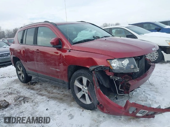 2016 Jeep Compass Latitude with VIN 1C4NJDEBXGD674518, listed as a IAAI auction lot 41956884 with 158,125 mi miles. Bid and sale history available at carsss.com. Image 1.