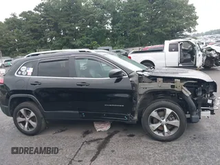 2021 Jeep Cherokee Limited z VIN 1C4PJMDX8MD121545, wystawiony jako IAAI lot #42706490 z przebiegiem 154 382 mil mil oraz . Historia ofert i sprzedaży dostępna na DreamBid. Obrazek 14.