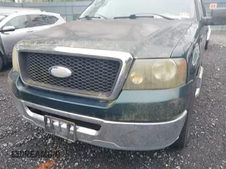 2007 Ford F-150 XL with VIN 1FTRF12257NA69161, listed as a IAAI auction lot 42195807 with 122,875 mi miles. Bid and sale history available at carsss.com. Image 6.