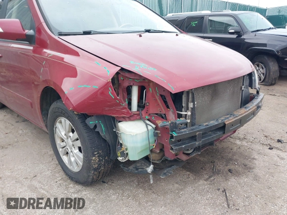 2012 Kia Sedona LX with VIN KNDMG4C75C6422392, listed as a IAAI auction lot 41235462 with 211,653 mi miles. Bid and sale history available at carsss.com. Image 6.