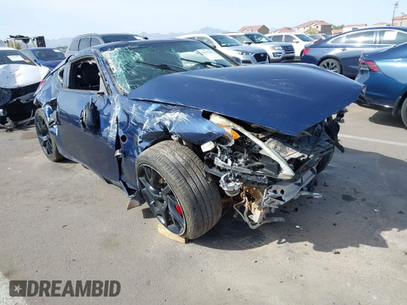 2013 Nissan 370Z z VIN JN1AZ4EH2DM380511, wystawiony jako IAAI lot #41912193 z przebiegiem Nie podano mil oraz . Historia ofert i sprzedaży dostępna na DreamBid. Obrazek 1.