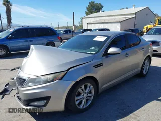 2013 Kia Optima EX with VIN 5XXGN4A7XDG128799, listed as a IAAI auction lot 41631612 with 191,124 mi miles. Bid and sale history available at carsss.com. Image 2.