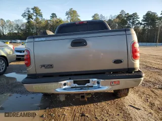 2001 Ford F-150 SuperCrew XLT with VIN 1FTRW07W31KA86300, listed as a Copart auction lot 57283434 with 129,416 mi miles and Salvage Title. Bid and sale history available at carsss.com. Image 6.