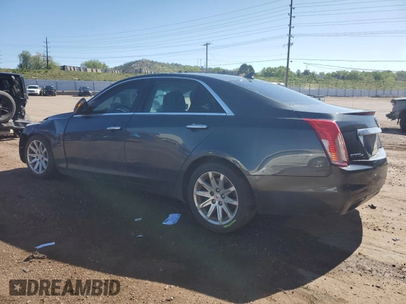 2014 Cadillac CTS AWD with VIN 1G6AW5SX2E0141060, listed as a Copart auction lot 57281445 with 137,904 mi miles and Salvage title. Bid and sale history available at DreamBid. Image 2.