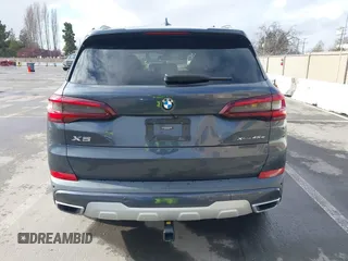 2021 BMW X5 xDrive45e with VIN 5UXTA6C09M9D26035, listed as a IAAI auction lot 41788981 with 60,571 mi miles and . Bid and sale history available at DreamBid. Image 16.