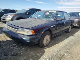 1989 Toyota Camry z VIN 4T1SV22E0KU032677, wystawiony jako Copart lot #46308555 z przebiegiem 993 896 mil mil oraz Czysty tytuł • Clean title. Historia ofert i sprzedaży dostępna na DreamBid. Obrazek 1.
