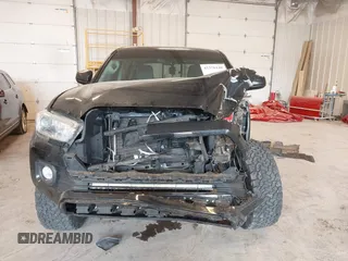 2017 Toyota Tacoma SR5 with VIN 5TFCZ5AN0HX053441, listed as a IAAI auction lot 42376148 with 100,996 mi miles and . Bid and sale history available at DreamBid. Image 12.