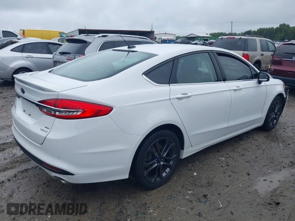 2018 Ford Fusion SE with VIN 3FA6P0HD6JR153230, listed as a IAAI auction lot 40336904 with 71,949 mi miles and . Bid and sale history available at DreamBid. Image 4.