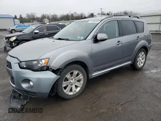 2013 Mitsubishi Outlander SE z VIN JA4JT3AW4DU000656, wystawiony jako Copart lot #51808395 z przebiegiem 158 479 mil mil oraz Szkoda całkowita • Salvage title. Historia ofert i sprzedaży dostępna na DreamBid. Obrazek 1.