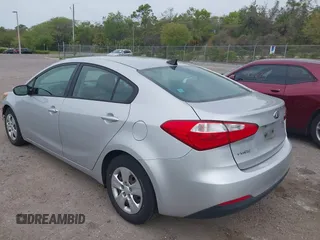 2015 Kia Forte LX with VIN KNAFK4A66F5407229, listed as a IAAI auction lot 41865696 with 124,232 mi miles. Bid and sale history available at carsss.com. Image 3.