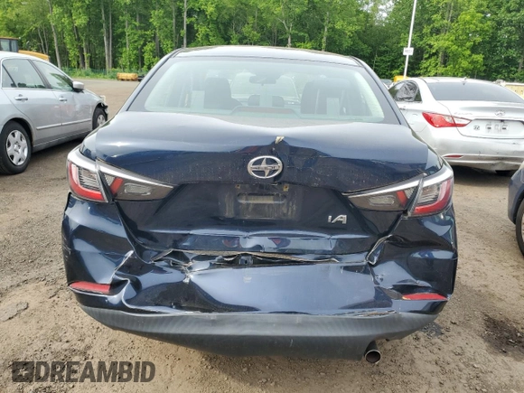 2016 Scion iA z VIN 3MYDLBZV6GY106568, wystawiony jako Copart lot #58303925 z przebiegiem 133 740 mil mil oraz Szkoda całkowita • Salvage title. Historia ofert i sprzedaży dostępna na DreamBid. Obrazek 6.