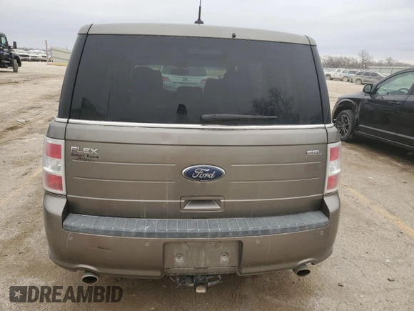 2013 Ford Flex SEL z VIN 2FMGK5C89DBD37239, wystawiony jako Copart lot #86277644 z przebiegiem 127 866 mil mil oraz Szkoda całkowita • Salvage title. Historia ofert i sprzedaży dostępna na DreamBid. Obrazek 6.