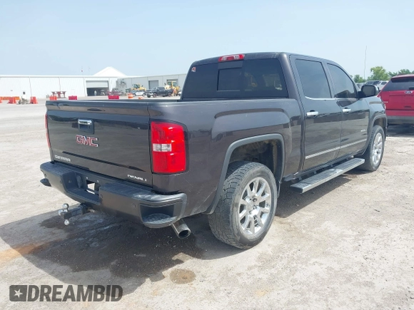 2014 GMC Sierra 1500 Denali with VIN 3GTU2WEC3EG390936, listed as a IAAI auction lot 42253577 with 196,852 mi miles and . Bid and sale history available at DreamBid. Image 4.