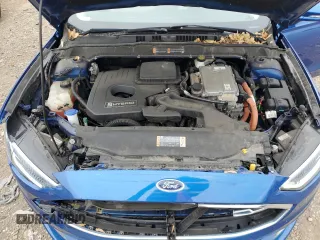 2017 Ford Fusion Hybrid Titanium with VIN 3FA6P0RU1HR138725, listed as a Copart auction lot 56650625 with 77,331 mi miles and Salvage title. Bid and sale history available at DreamBid. Image 11.