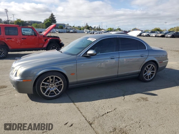 2005 Jaguar S-Type with VIN SAJWA01T15FN13800, listed as a Copart auction lot 53576305 with 182,533 mi miles and Salvage Title. Bid and sale history available at DreamBid. Image 1.